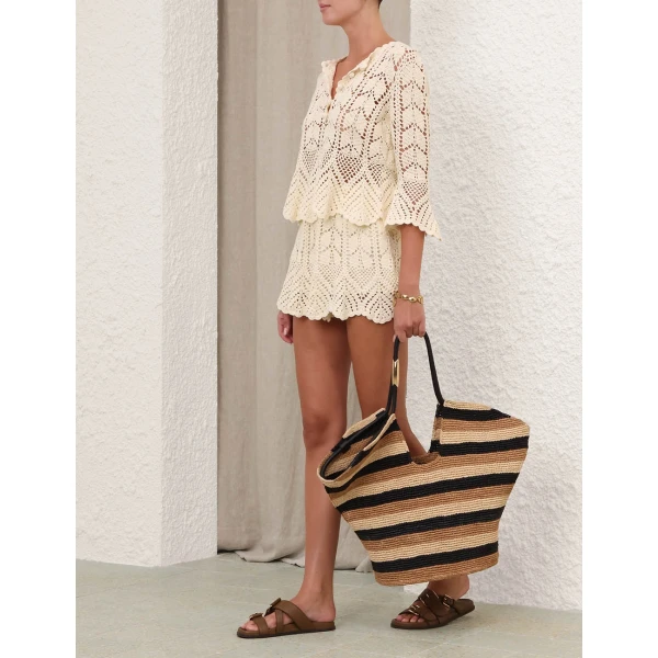 Elevate your elegance in this Zimmermann Tops   from the 2025 resort wear edit