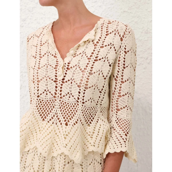 Elevate your elegance in this Zimmermann Tops   from the 2025 resort wear edit