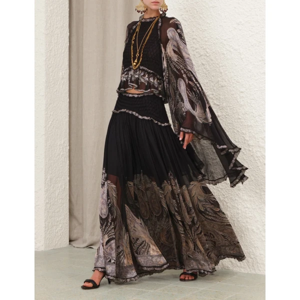 Elevate your elegance in this Zimmermann Tops   from the 2025 resort wear edit