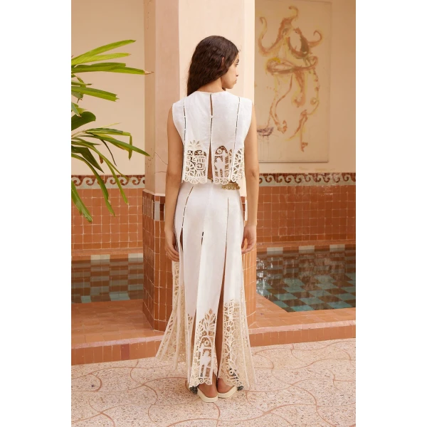 Elevate your elegance in this Alemais Tops from the resort wear edit