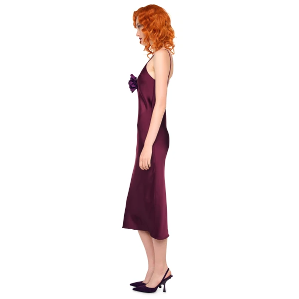 Elevate your elegance in this Norma Kamali  from the resort wear edit