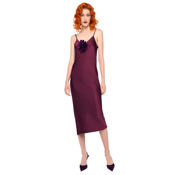 Elevate your elegance in this Norma Kamali  from the resort wear edit