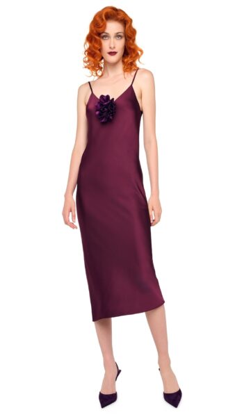 Elevate your elegance in this Norma Kamali  from the resort wear edit