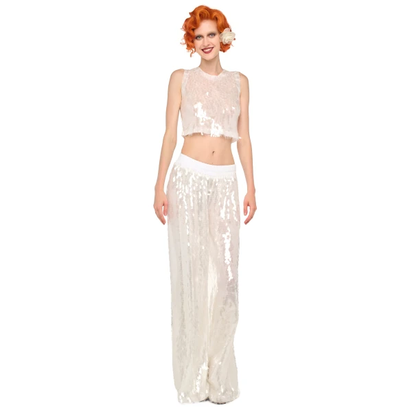 Elevate your elegance in this Norma Kamali  from the resort wear edit