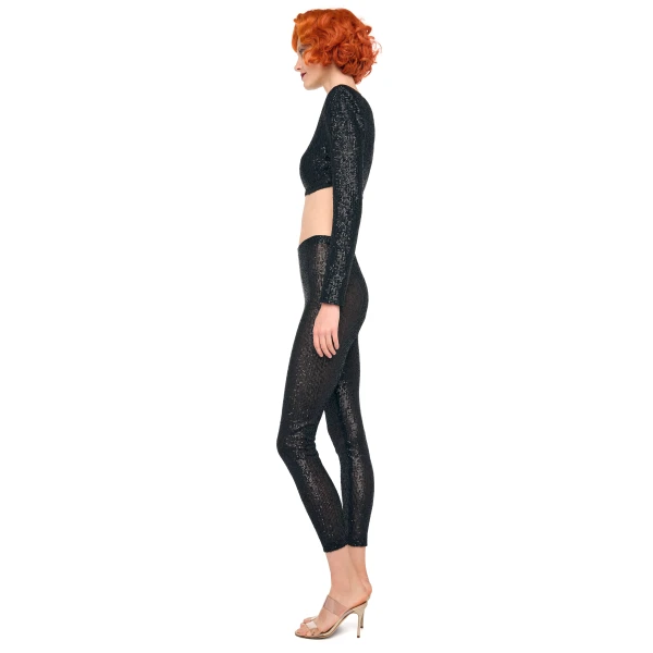Elevate your elegance in this Norma Kamali  from the resort wear edit