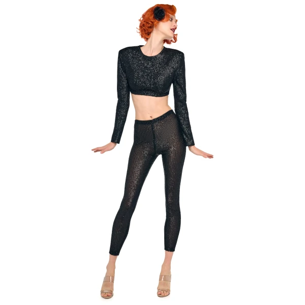Elevate your elegance in this Norma Kamali  from the resort wear edit