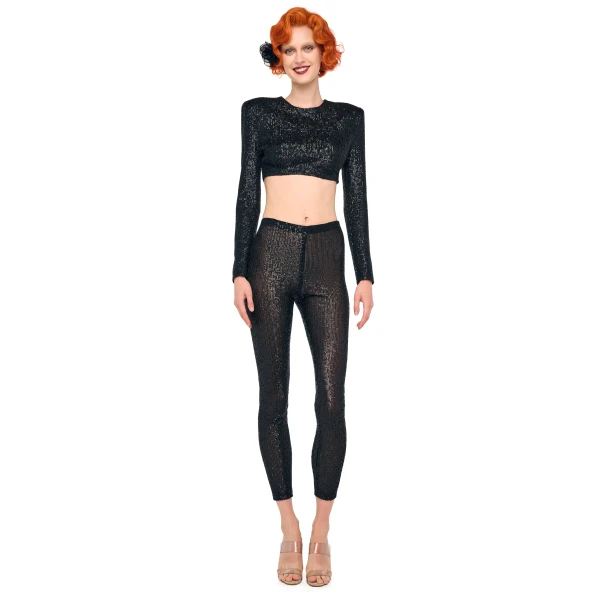 Elevate your elegance in this Norma Kamali  from the resort wear edit