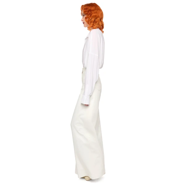 Elevate your elegance in this Norma Kamali  from the resort wear edit