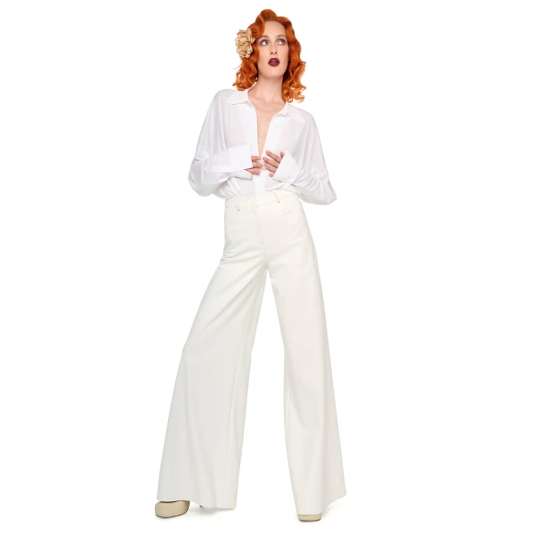 Elevate your elegance in this Norma Kamali  from the resort wear edit