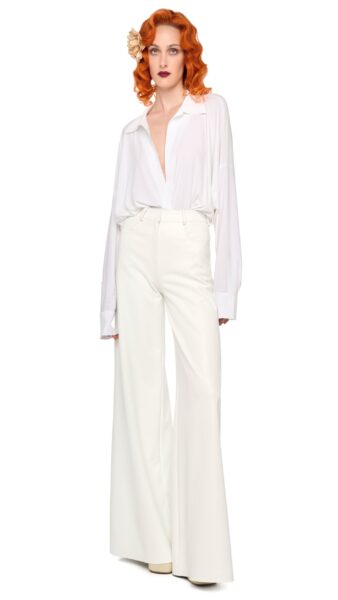 Elevate your elegance in this Norma Kamali  from the resort wear edit