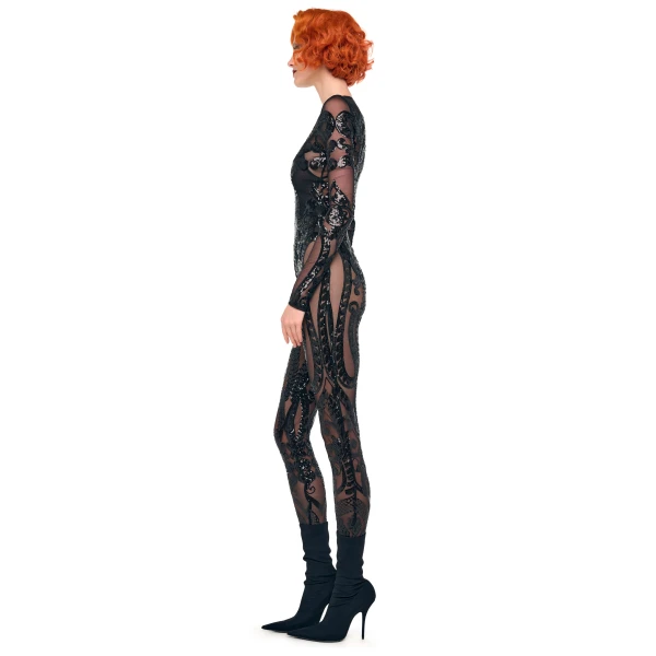 Elevate your elegance in this Norma Kamali  from the resort wear edit