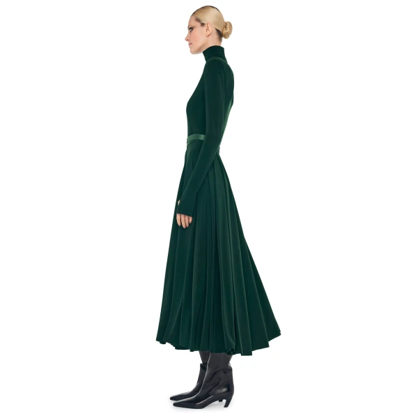 Elevate your elegance in this Norma Kamali  from the resort wear edit