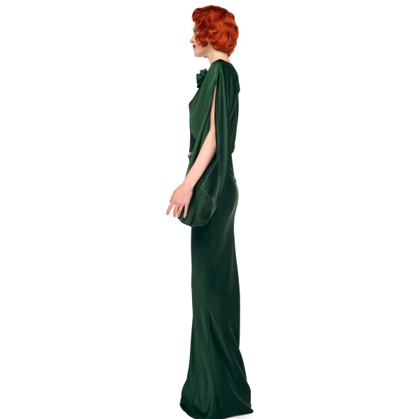 Elevate your elegance in this Norma Kamali  from the resort wear edit