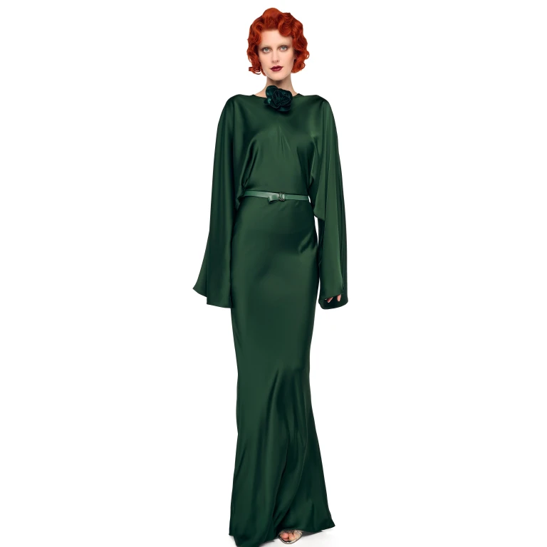 Elevate your elegance in this Norma Kamali  from the resort wear edit