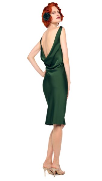 Elevate your elegance in this Norma Kamali  from the resort wear edit