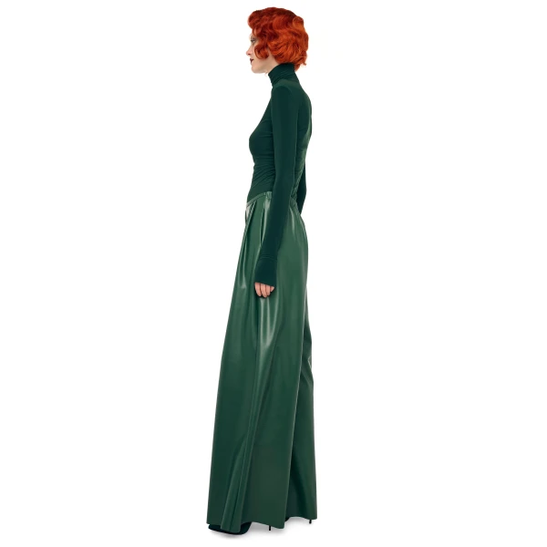 Elevate your elegance in this Norma Kamali  from the resort wear edit