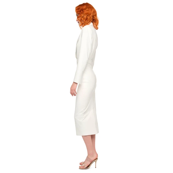 Elevate your elegance in this Norma Kamali  from the resort wear edit