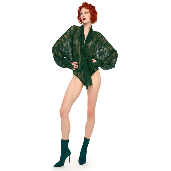 Elevate your elegance in this Norma Kamali  from the resort wear edit