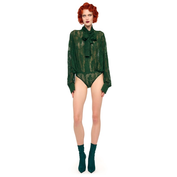 Elevate your elegance in this Norma Kamali  from the resort wear edit