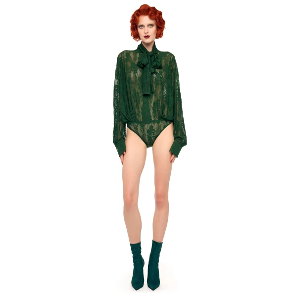 Elevate your elegance in this Norma Kamali  from the resort wear edit