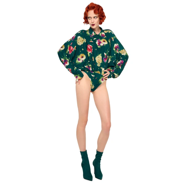 Elevate your elegance in this Norma Kamali  from the resort wear edit