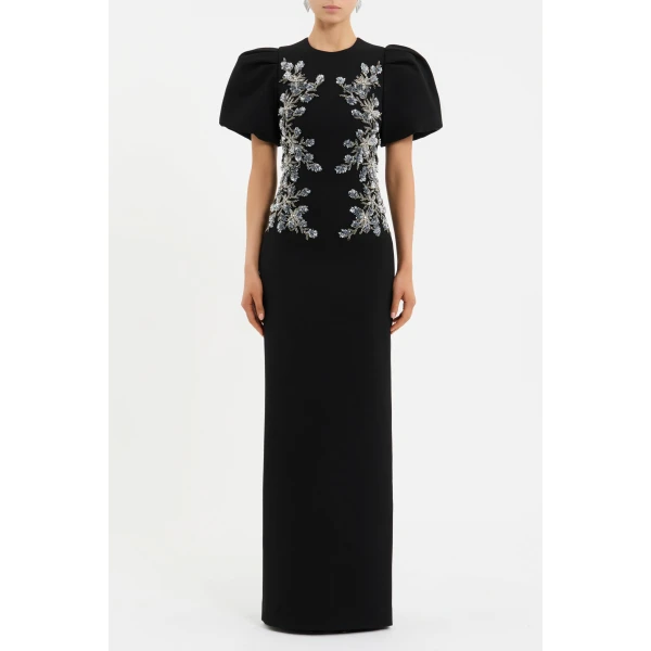adorned with intricate floral beaded applique. Tailored from bonded crepe