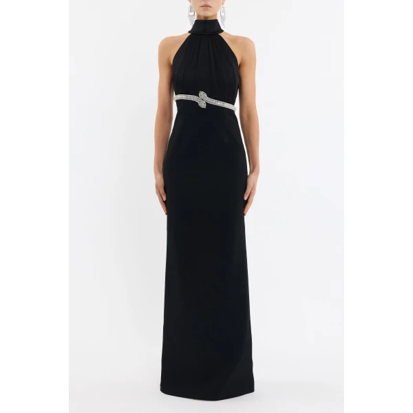 featuring diamante-embellished snake motifs for a touch of opulence. Its halter neckline and asymmetrical pleated bodice sculpt a sophisticated shape