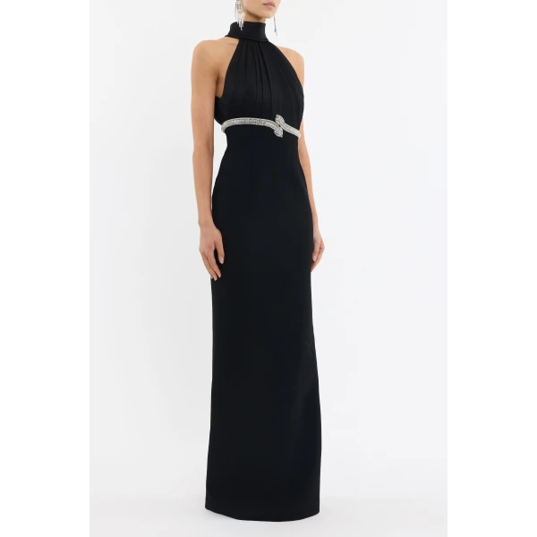 cinched at the waist to flatter the figure. The column maxi skirt is detailed with a back split for ease of movement
