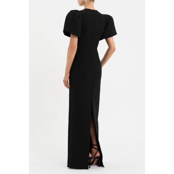 cinched at the waist to flatter the figure. The column maxi skirt offers an elegant silhouette