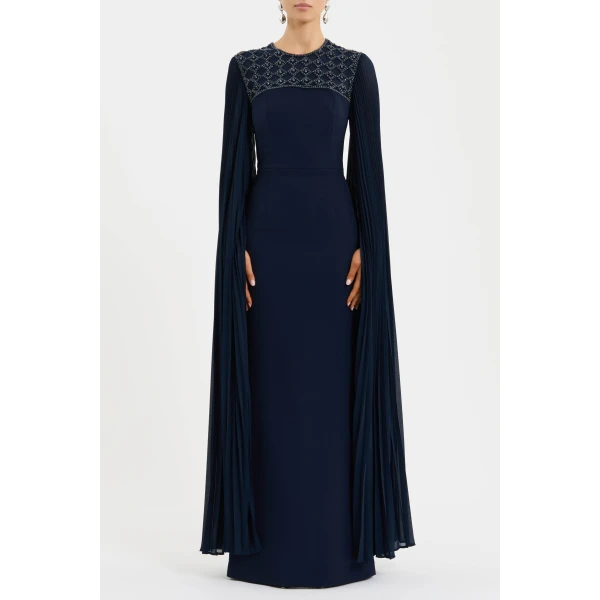 adorned with intricate embellishments that exude refined opulence. Featuring striking sheer pleated long sleeves
