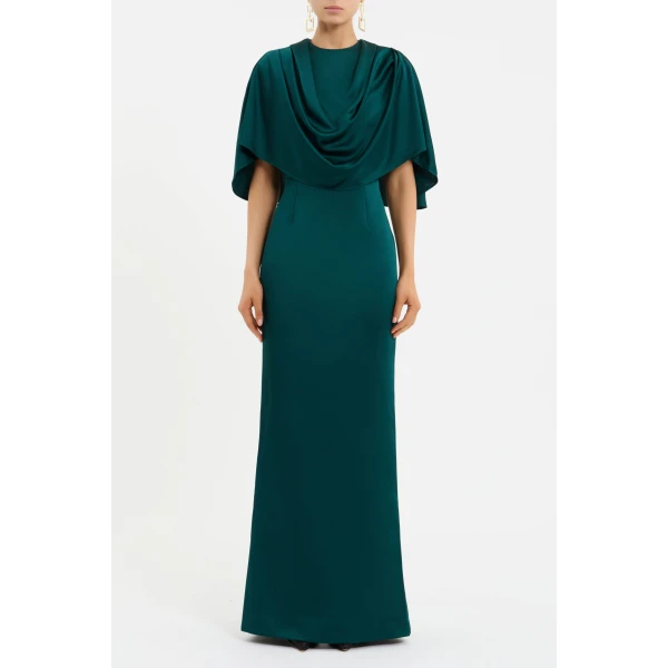 tailored from bonded satin. It features a striking draped cape overlay that exudes refined elegance