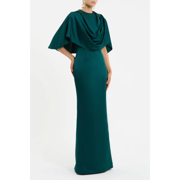 complemented by a fitted bodice cinched at the waist. The column maxi skirt shapes a graceful silhouette