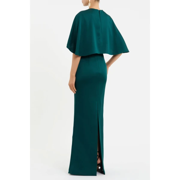 enhanced by a back split for ease of wear. Lined and secured with a zip fastening at the back
