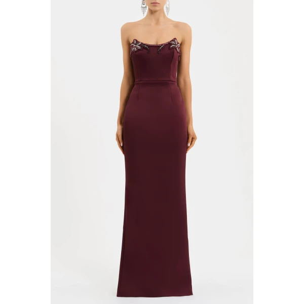 adorned with intricate hand embellished applique. Tailored from bonded satin