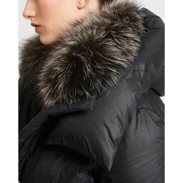 Woman wearing Yves Salomon shearling fur coat – luxury outerwear at Luxury Shoes 
