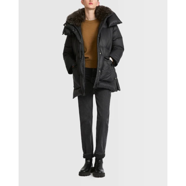 Woman wearing Yves Salomon shearling fur coat – luxury outerwear at Luxury Shoes 