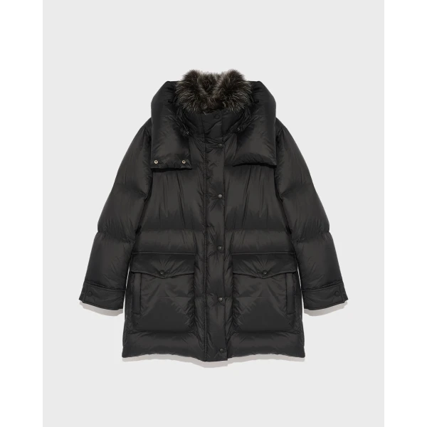 Woman wearing Yves Salomon shearling fur coat – luxury outerwear at Luxury Shoes 