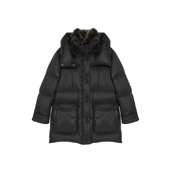Woman wearing Yves Salomon shearling fur coat – luxury outerwear at Luxury Shoes 