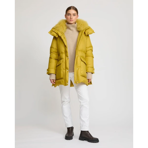 Woman wearing Yves Salomon shearling fur coat – luxury outerwear at Luxury Shoes 