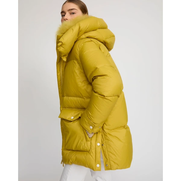 Woman wearing Yves Salomon shearling fur coat – luxury outerwear at Luxury Shoes 