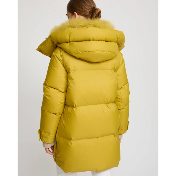 Woman wearing Yves Salomon shearling fur coat – luxury outerwear at Luxury Shoes 