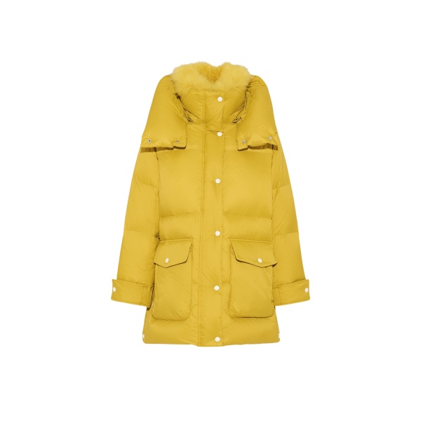 Woman wearing Yves Salomon shearling fur coat – luxury outerwear at Luxury Shoes 