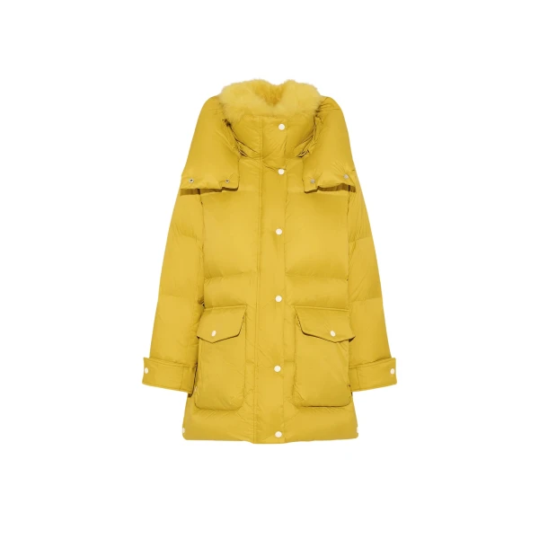 Woman wearing Yves Salomon shearling fur coat – luxury outerwear at Luxury Shoes 