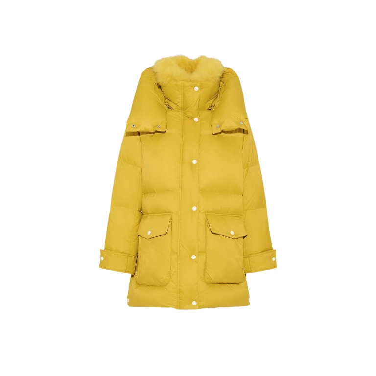 Woman wearing Yves Salomon shearling fur coat – luxury outerwear at Luxury Shoes 