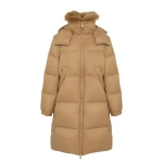 Woman wearing Yves Salomon shearling fur coat – luxury outerwear at Luxury Shoes 