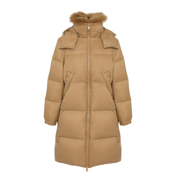 Woman wearing Yves Salomon shearling fur coat – luxury outerwear at Luxury Shoes 