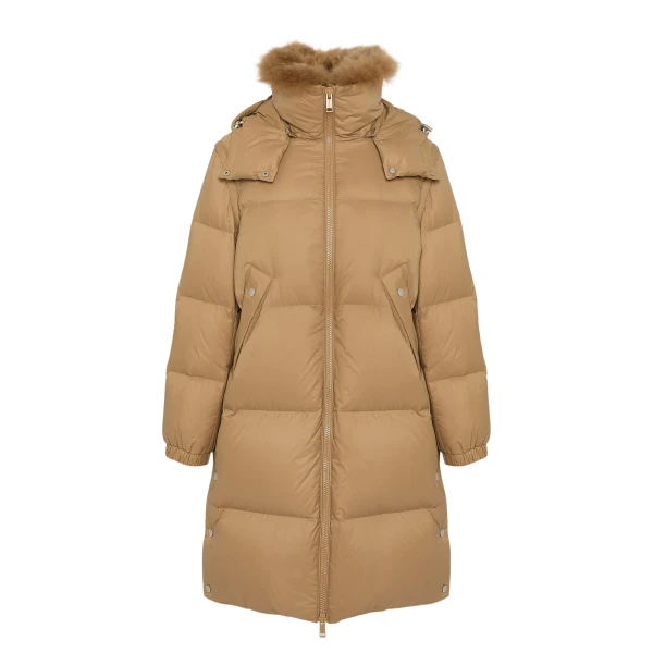 Woman wearing Yves Salomon shearling fur coat – luxury outerwear at Luxury Shoes 