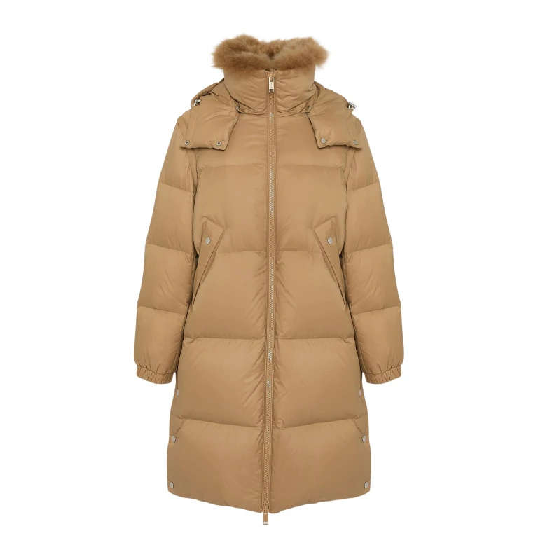 Woman wearing Yves Salomon shearling fur coat – luxury outerwear at Luxury Shoes 