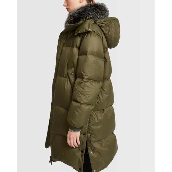 Woman wearing Yves Salomon shearling fur coat – luxury outerwear at Luxury Shoes 