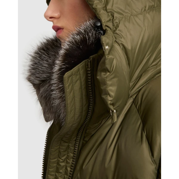 Woman wearing Yves Salomon shearling fur coat – luxury outerwear at Luxury Shoes 